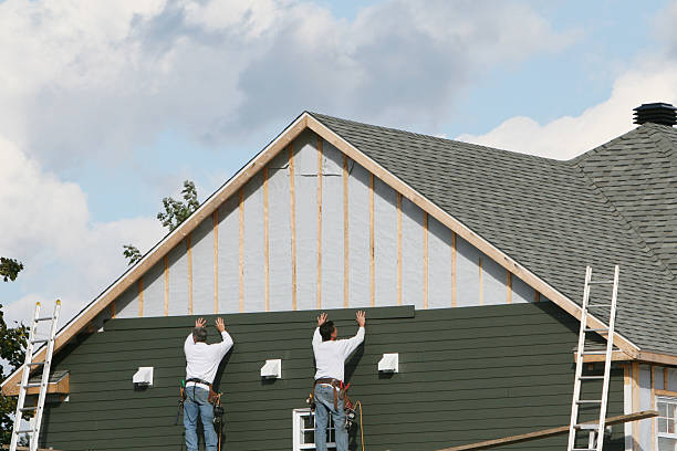 Professional Siding Installation technician working in Homestead, PA